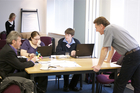 George in discussion with Andrew, Laura and Michael from JISC TechDis